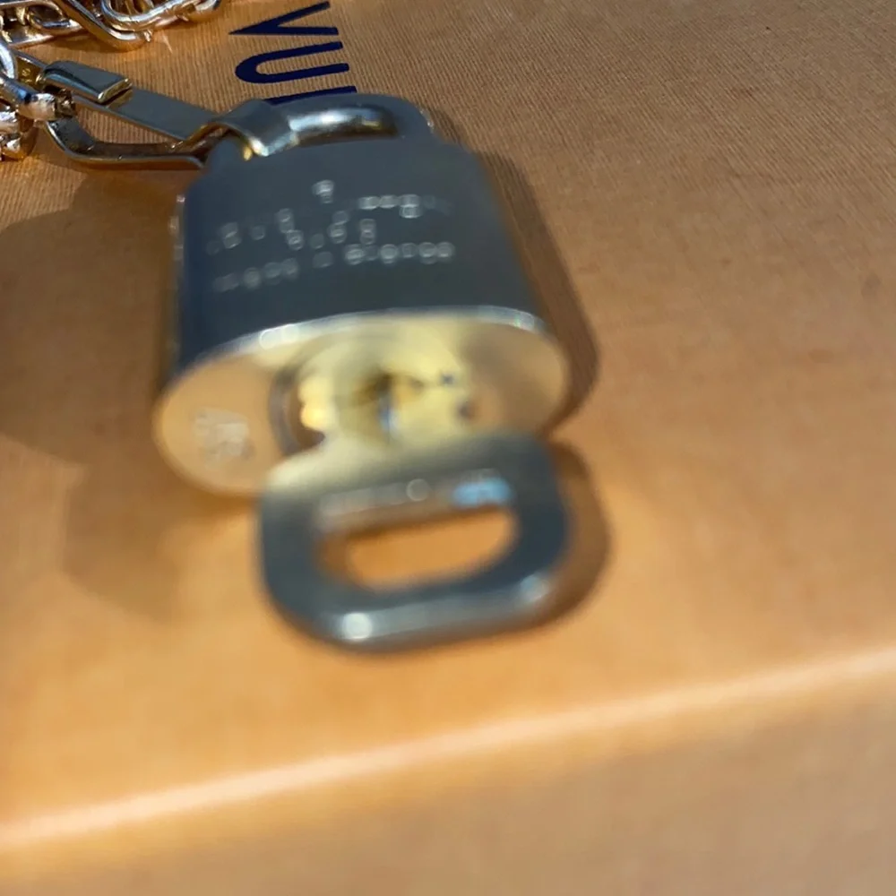 Authentic Louis Vuitton Lock and Key Set on a Chain. - Picture 5 of 10